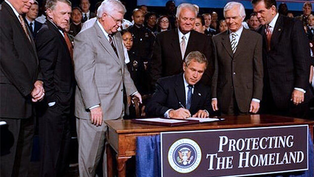 26-10-2001-george-w-bush-signs-the-patriot-act